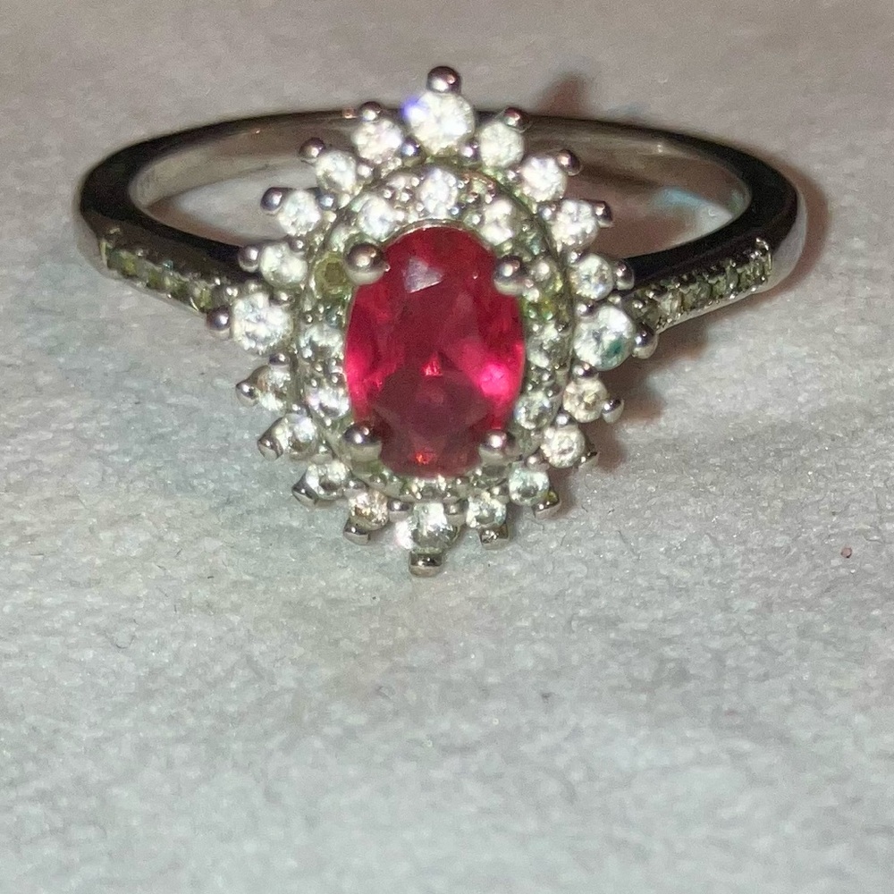 925 Sterling Silver and Red Gemstone Ring
Size 9